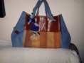 Cartera Azul turquesa y Cuero. Bs.F 600.